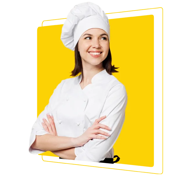 Chef profesional de con uniforme de cocina y brazos cruzados.